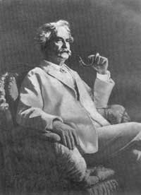 Марк Твен в глубоком кресле и со знаменитой трубкой